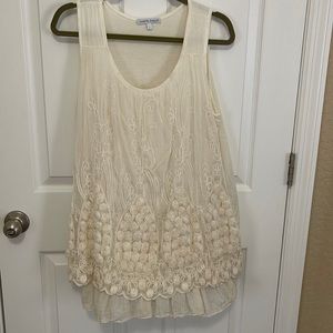 Light and airy off-white sleeveless top